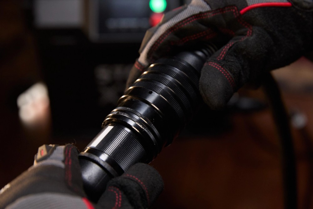 Person extending cable